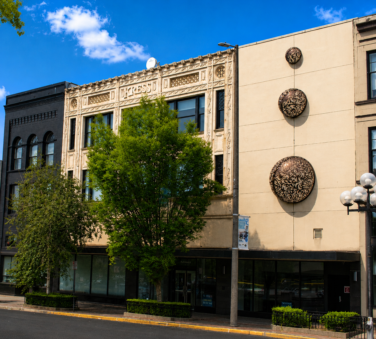 The Kress Building exterior at 932 Broadway — ornate 1925 facade with commissioned sphere sculptures, Tacoma Theater District